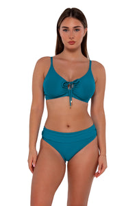 Front pose #1 of Taylor wearing Sunsets Avalon Teal Kauai Keyhole Top paired with Unforgettable Bottom swim hipster