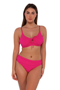 Front pose #1 of Taylor wearing Sunsets Begonia Sandbar Rib Unforgettable Bottom paired with Kauai Keyhole bikini top