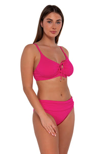 Side pose #1 of Taylor wearing Sunsets Begonia Sandbar Rib Unforgettable Bottom paired with Kauai Keyhole bikini top