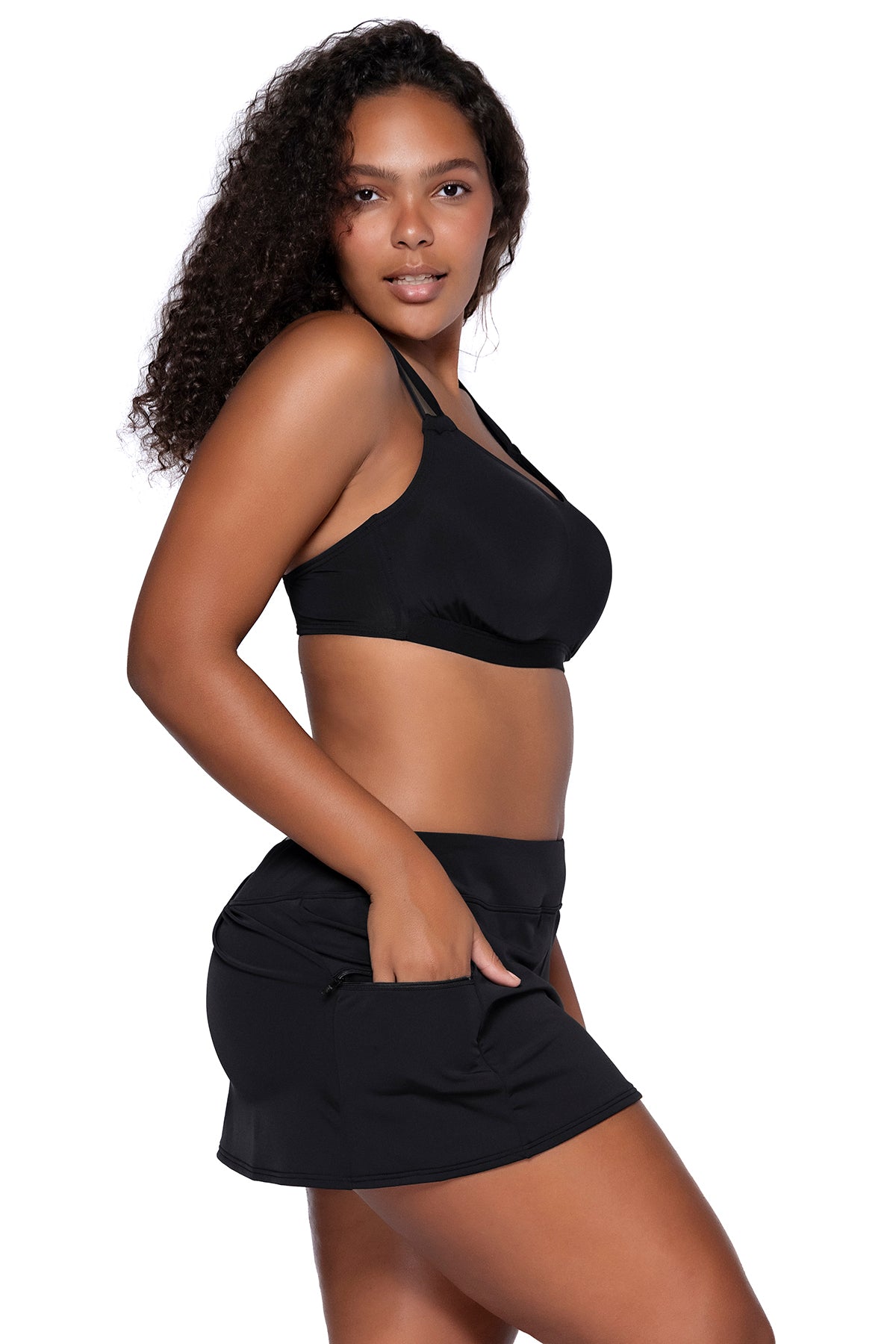 Side view of Sunsets Black Taylor Bralette Top with matching Sporty Swim Skirt