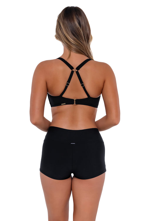 Back pose #1 of Taylor wearing Sunsets Black Kinsley Swim Short with matching Taylor Bralette bikini top