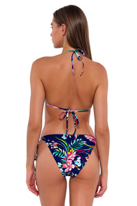 Back pose #1 of Daria wearing Sunsets Island Getaway Everlee Tie Side Bottom with matching Laney Triangle bikini top