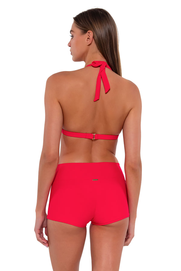Back pose #1 of Daria wearing Sunsets Geranium Kinsley Swim Short with matching Faith Halter bikini top