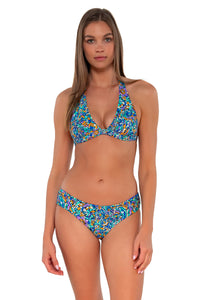 Front pose #1 of Daria wearing Sunsets Pansy Fields Alana Reversible Hipster Bottom with matching Faith Halter bikini top