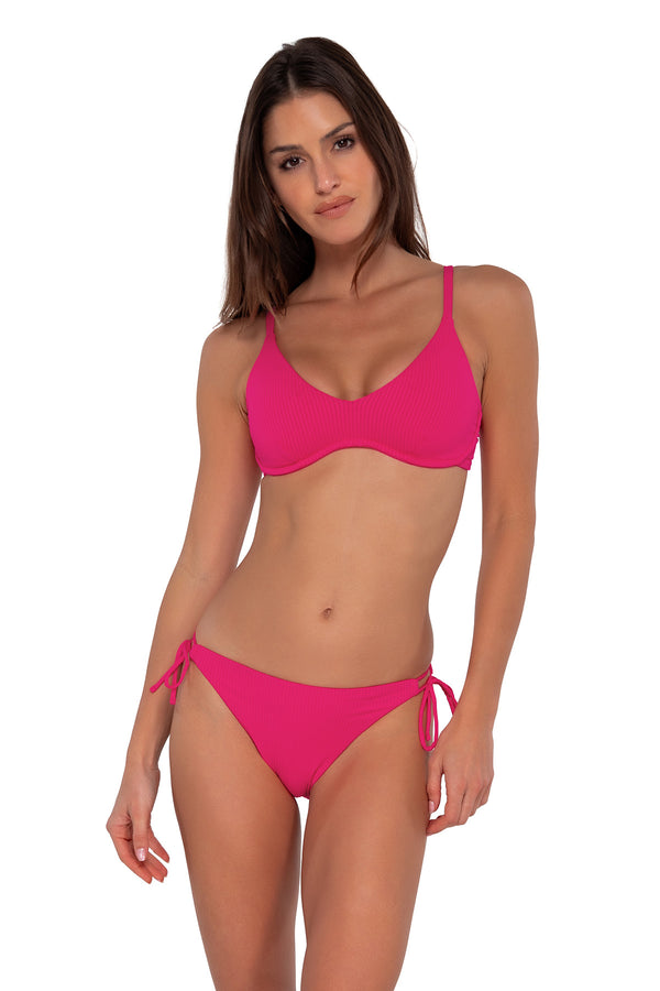 Front pose #1 of Gigi wearing Sunsets Begonia Sandbar Rib Everlee Tie Side Bottom paired with Brooke U-Wire bikini top