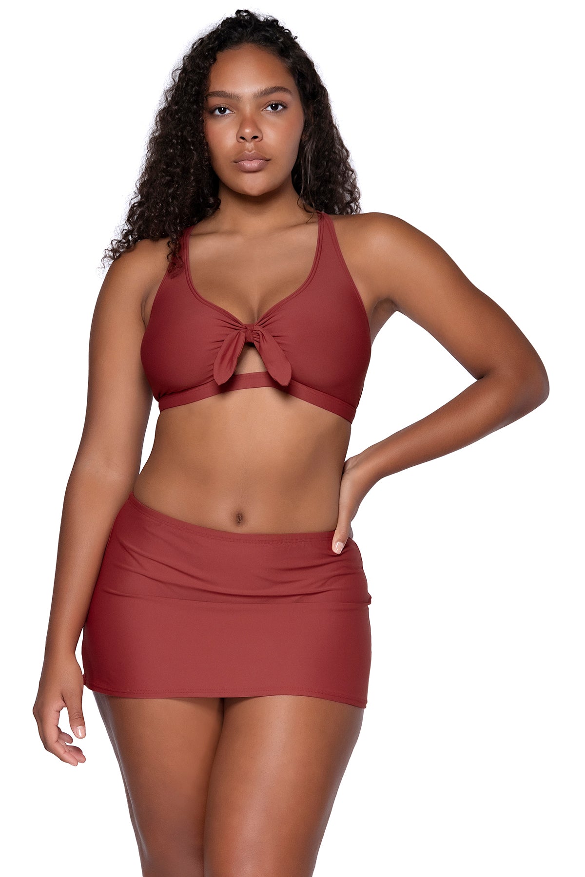 Charger l&amp;#39;image dans la galerie, Front view of Sunsets Tuscan Red Brandi Bralette bikini top showing keyhole front tie with Tuscan Red Kokomo Swim Skirt featuring additional model
