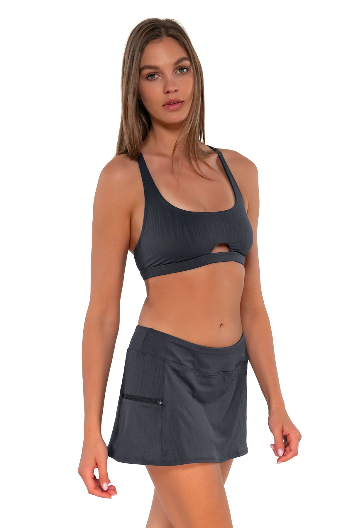 Side pose #1 of Daria wearing Sunsets Slate Seagrass Texture Sporty Swim Skirt with matching Brandi Bralette bikini top