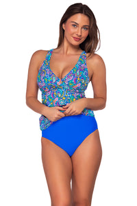 Front view of Sunsets Persian Sky Elsie Tankini Top lifted up to show matching High Road Bottom bikini
