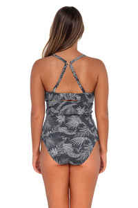 Back pose #1 of Taylor wearing Sunsets Fanfare Seagrass Texture Zuri V-Wire Tankini Top showing crossback straps with matching Hannah High Waist bikini bottom