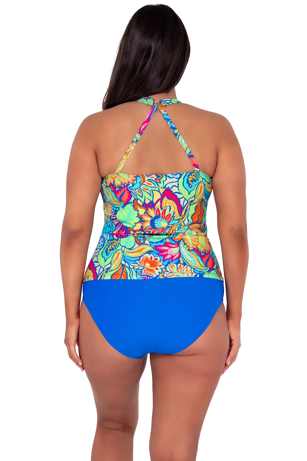 pose #1 of Nicki wearing Sunsets Escape Fiji Sandbar Rib Emerson Tankini Top showing crossback straps paired with Hannah High Waist in Electric Blue