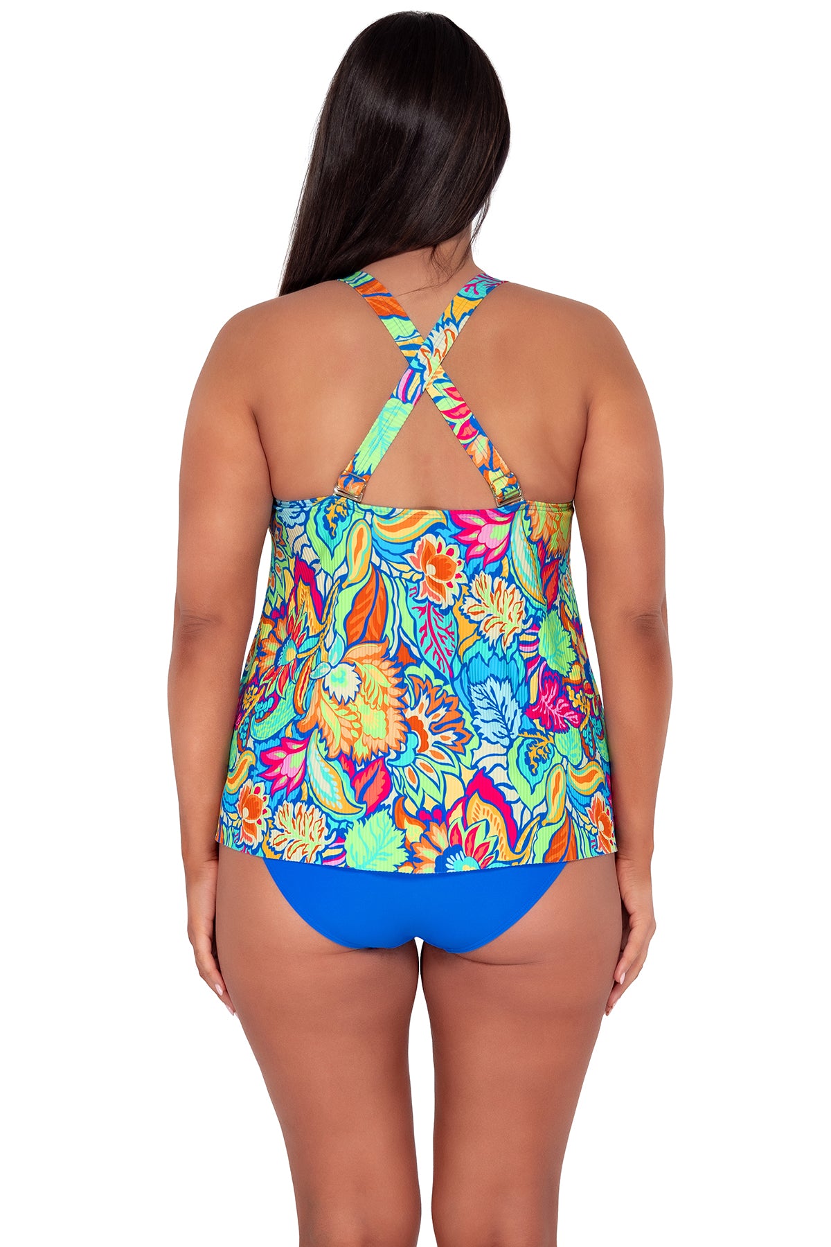 pose #1 of Nicki wearing Sunsets Escape Fiji Sandbar Rib Sadie Tankini Top showing crossback straps paired with Hannah High Waist in Electric Blue