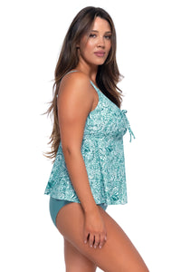 Side pose #1 of Nicky wearing Sunsets Escape By the Sea Marin Tankini Top with matching Hannah High Waist bikini bottom