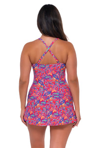Back pose #1 of Nicky wearing Sunsets Escape Rue Paisley Sienna Swim Dress showing crossback straps