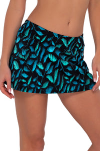 Side pose #1 of Gigi wearing Sunsets Cascade Seagrass Texture Sporty Swim Skirt