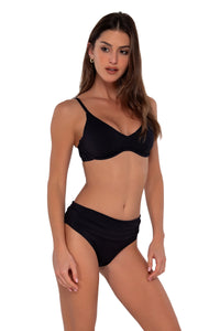 Side pose #1 of Gigi wearing Sunsets Black Seagrass Texture Unforgettable Bottom with matching Brooke U-Wire bikini top