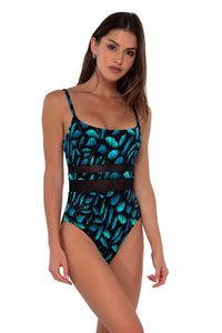 Side pose #1 of Gigi wearing Sunsets Cascade Seagrass Texture Alexia One Piece