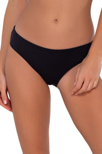 Front pose #1 of Gigi wearing Sunsets Black Seagrass Texture Collins Hipster Bottom