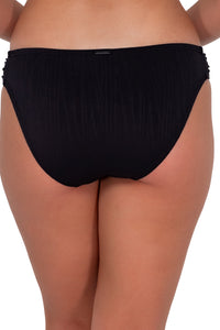 Back pose #1 of Taylor wearing Sunsets Black Seagrass Texture Audra Hipster Bottom