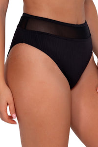 Side pose #1 of Taylor wearing Sunsets Black Seagrass Texture Annie High Waist Bottom