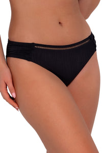 Side pose #1 of Taylor wearing Sunsets Black Seagrass Texture Audra Hipster Bottom