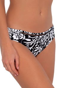 Side pose #1 of Gigi wearing Sunsets Caribbean Seagrass Texture Audra Hipster Bottom