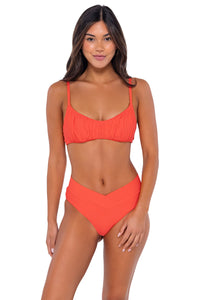 Front pose #1 of Chonzie wearing Swim Systems Tangelo Delfina V Front Bottom with matching Bonnie bikini top