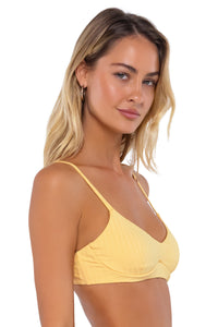 Side pose #1 of Jessica wearing Swim Systems Honey Bay Rib Annalee Underwire Top